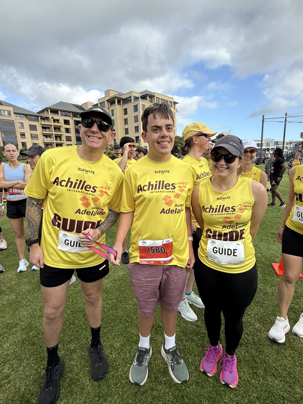 Corey, Alex and Tiani at the end of the Glenelg Classic run in November 2025
