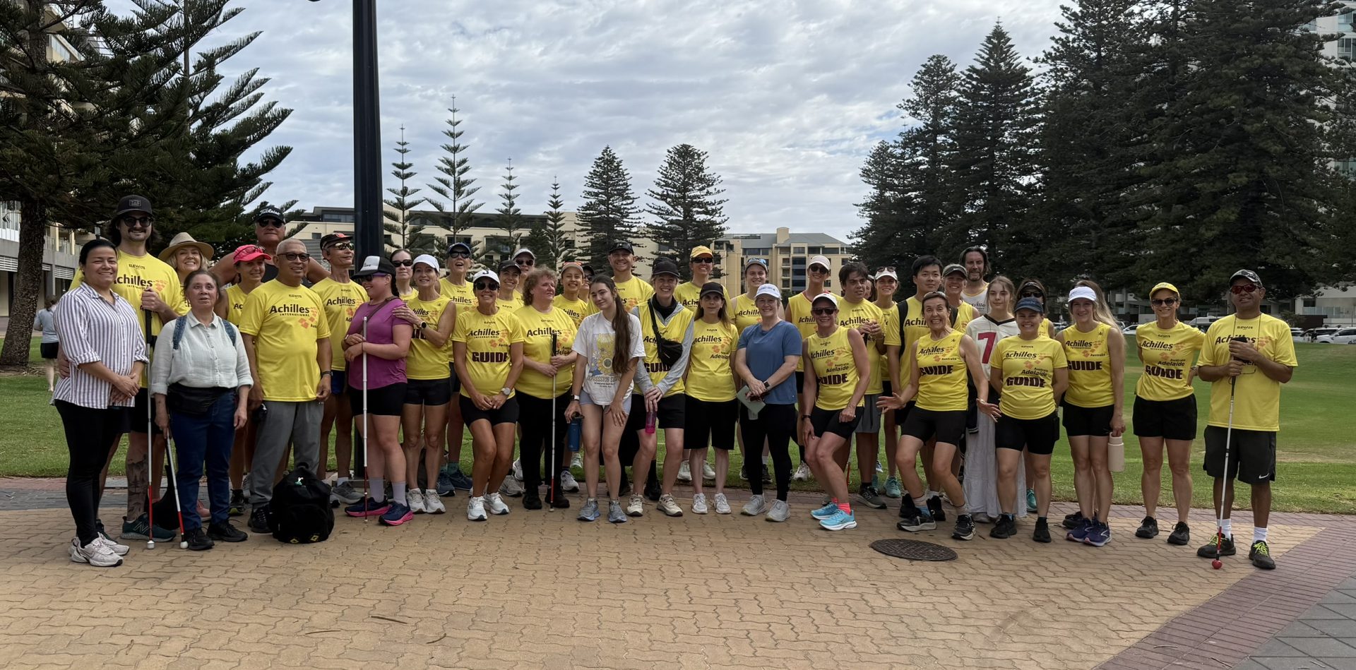 Achilles Adelaide members together at Glenelg after a training session