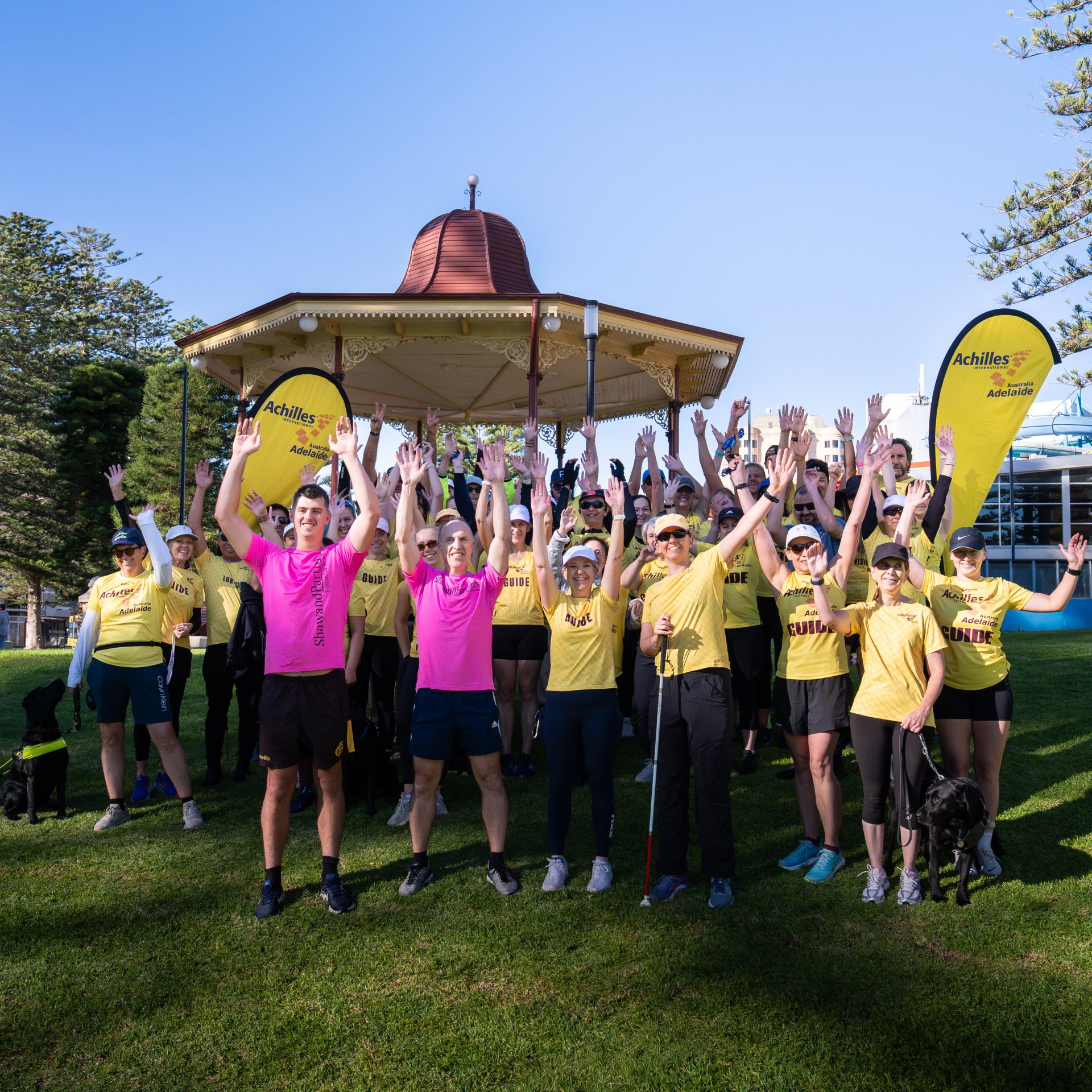 Square Achilles Adelaide team with hands up in excitement from Shaw and Partners donation