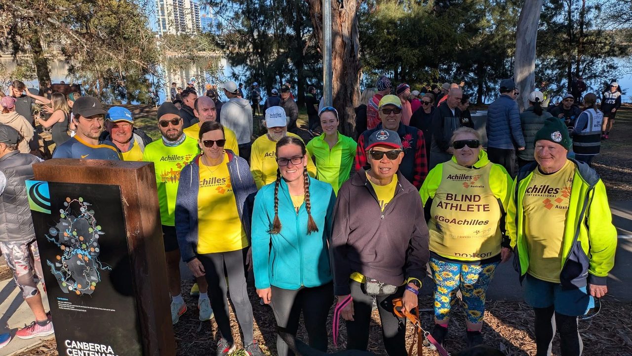 Brent Peter R Singh Liz Peter G standing behind Lizz Nicola Lindy standing in front of Chris Leonie and David